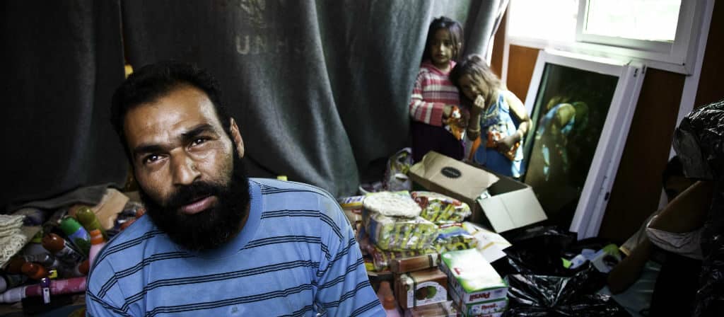 A Syrian refugee and his daughters show their shelter in Za'atari refugee camp in northern Jordan in 2016. Photo Ala'a al Suhkni